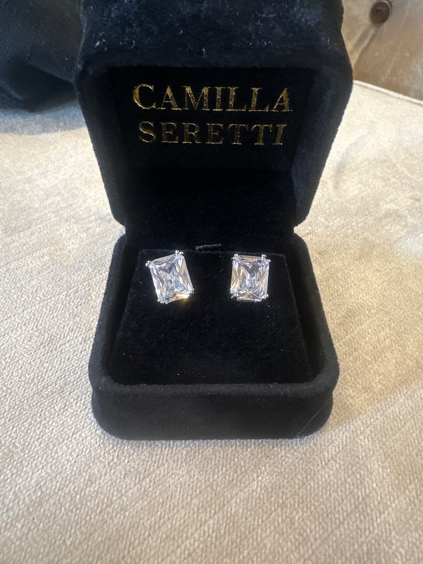 Emerald cut solitaire earrings